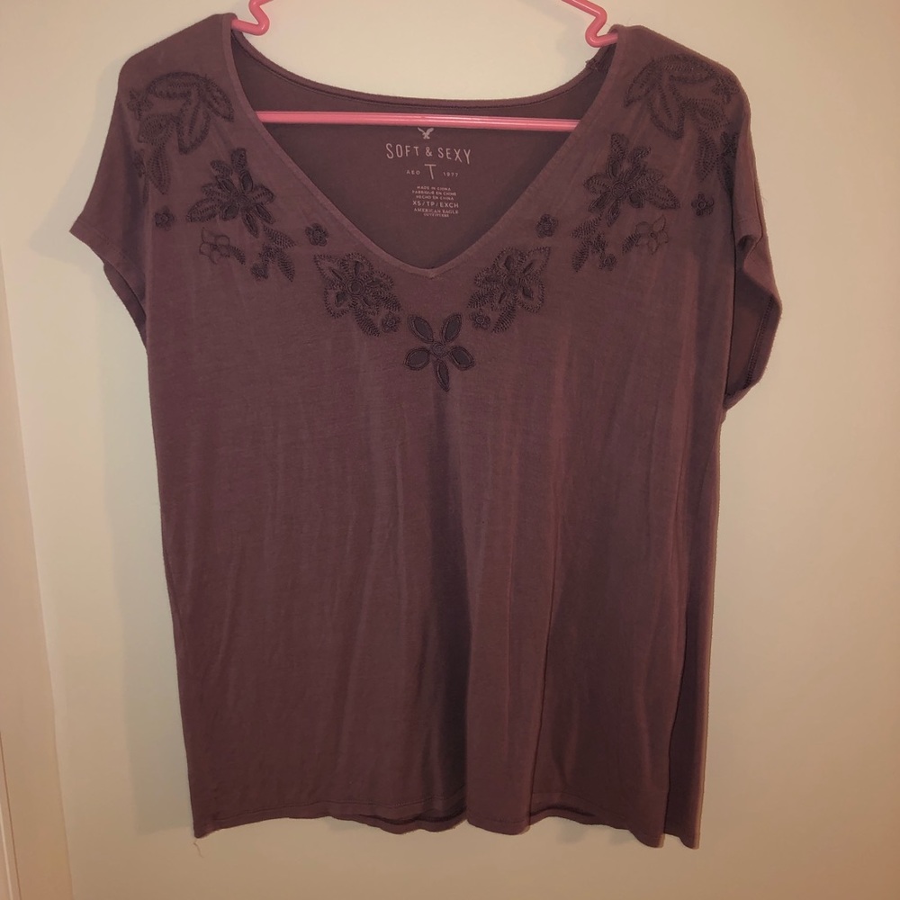 American eagle T-shirt with flower design.